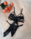 Luxurious satin bow bra set with matching thong, elegant and modern style, perfect for all-season comfort and chic homewear.