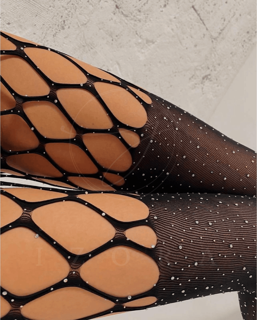 Elegant Noemi fishnet body stocking with intricate design, highlighting delicate pattern and local craftsmanship for women.